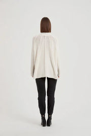 Lenny Funnel Neck Rib Detail | Ivory | TIRELLI